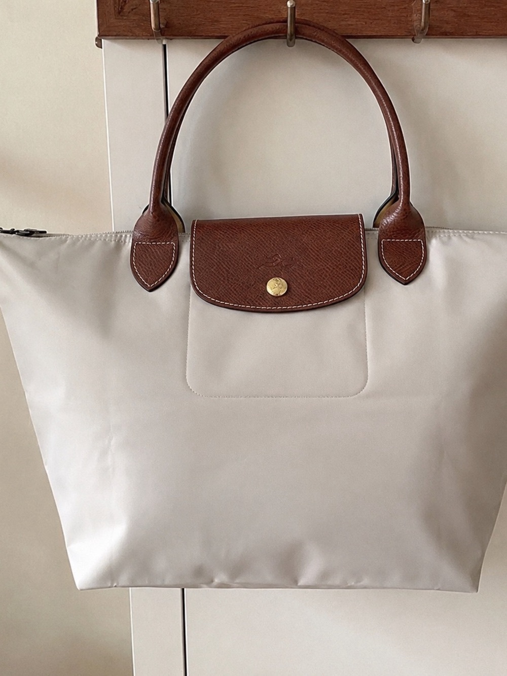 Longchamp Cream Tote with Brown Leather Handles and Flap